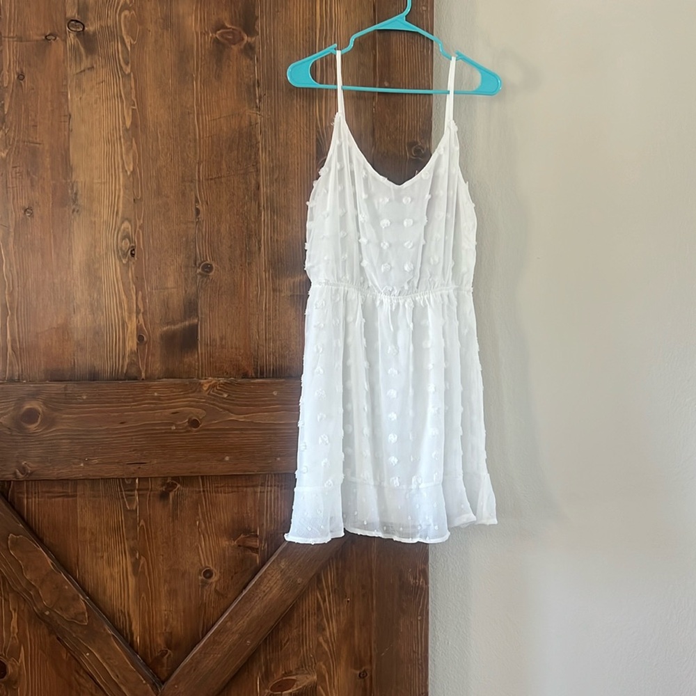 Lovely white garden dress by Emerald Sunday